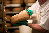 Each wheel is washed by hand at least once a week for the year or more that it's aged, turning the rinds a rich, speckled brown