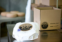 Once a batch has reached its peak, we wrap its 70 wheels and send them out to shops and restaurants across the country